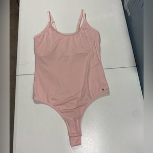 - - Lucky Brand light pink body suite size L. Smoke/pet free home